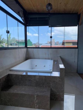 Loft com Hidro no centro